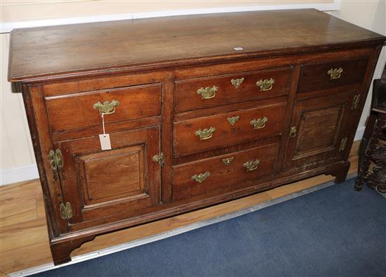 A George III oak dresser base, L.165cm
